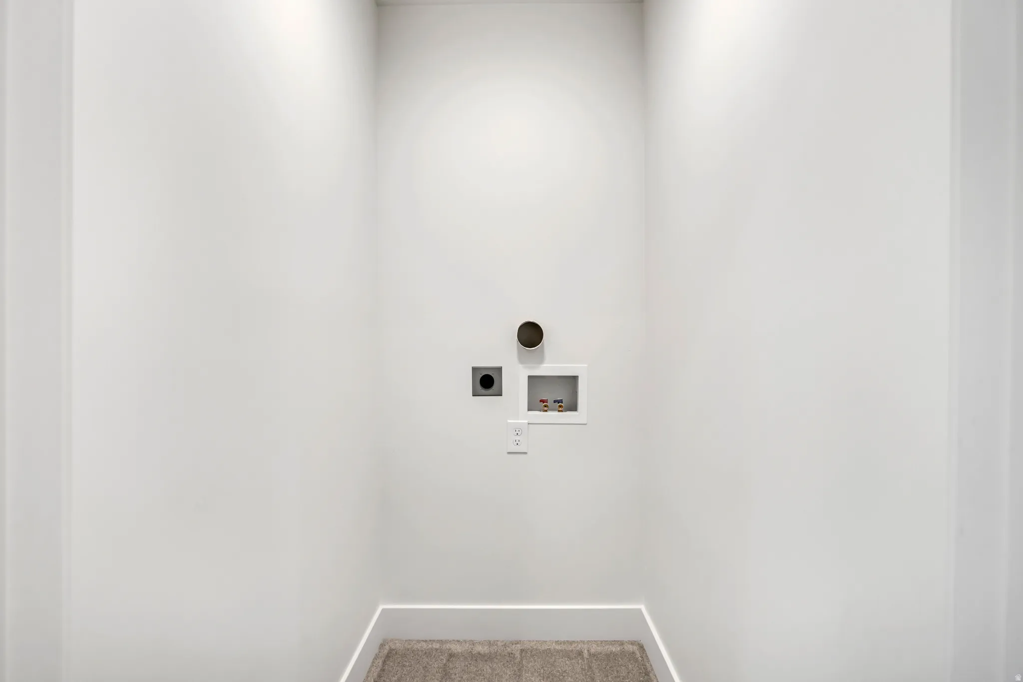 Laundry room featuring washer hookup and electric dryer hookup