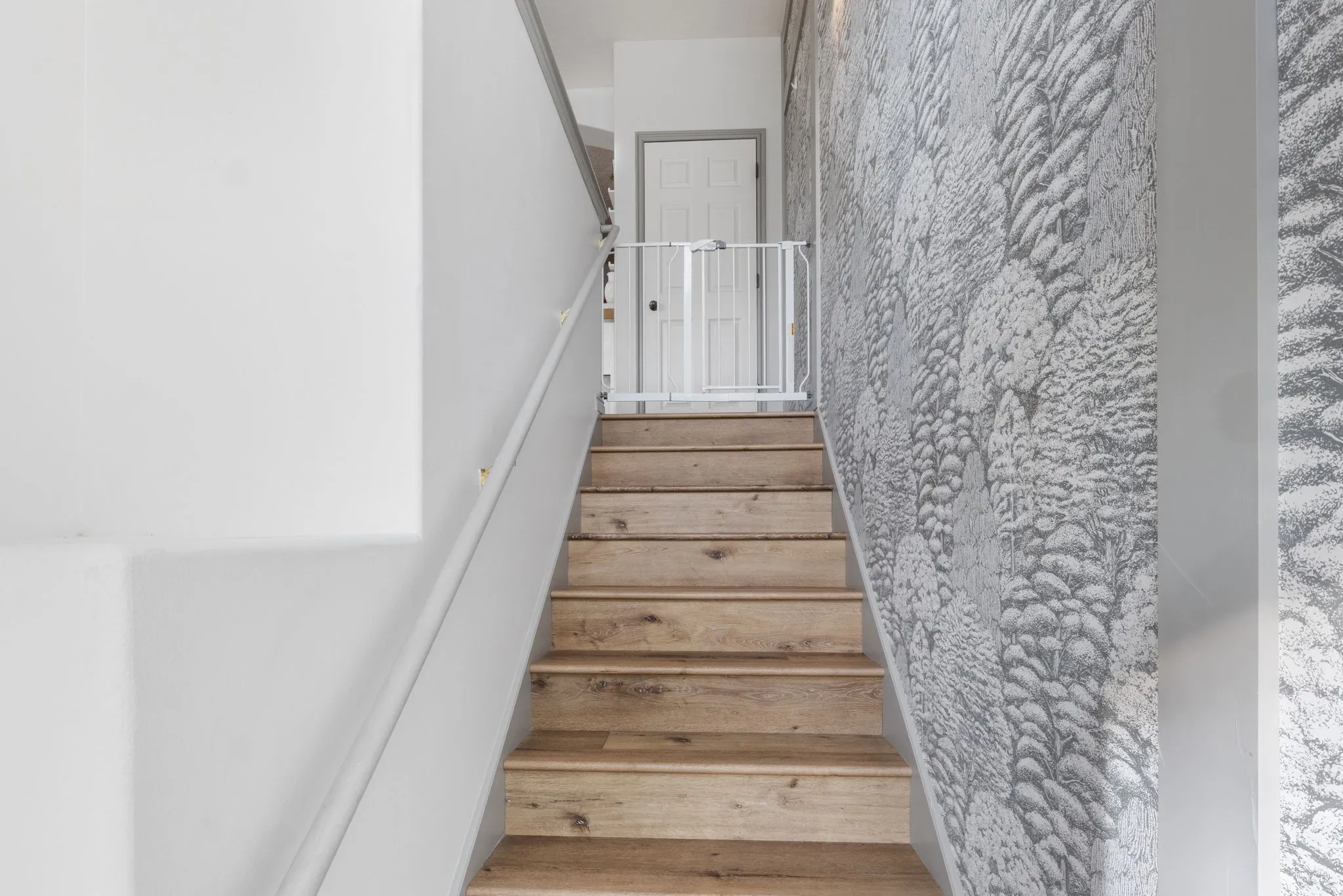 View of stairway from Front Door Entrance or Garage Entrance