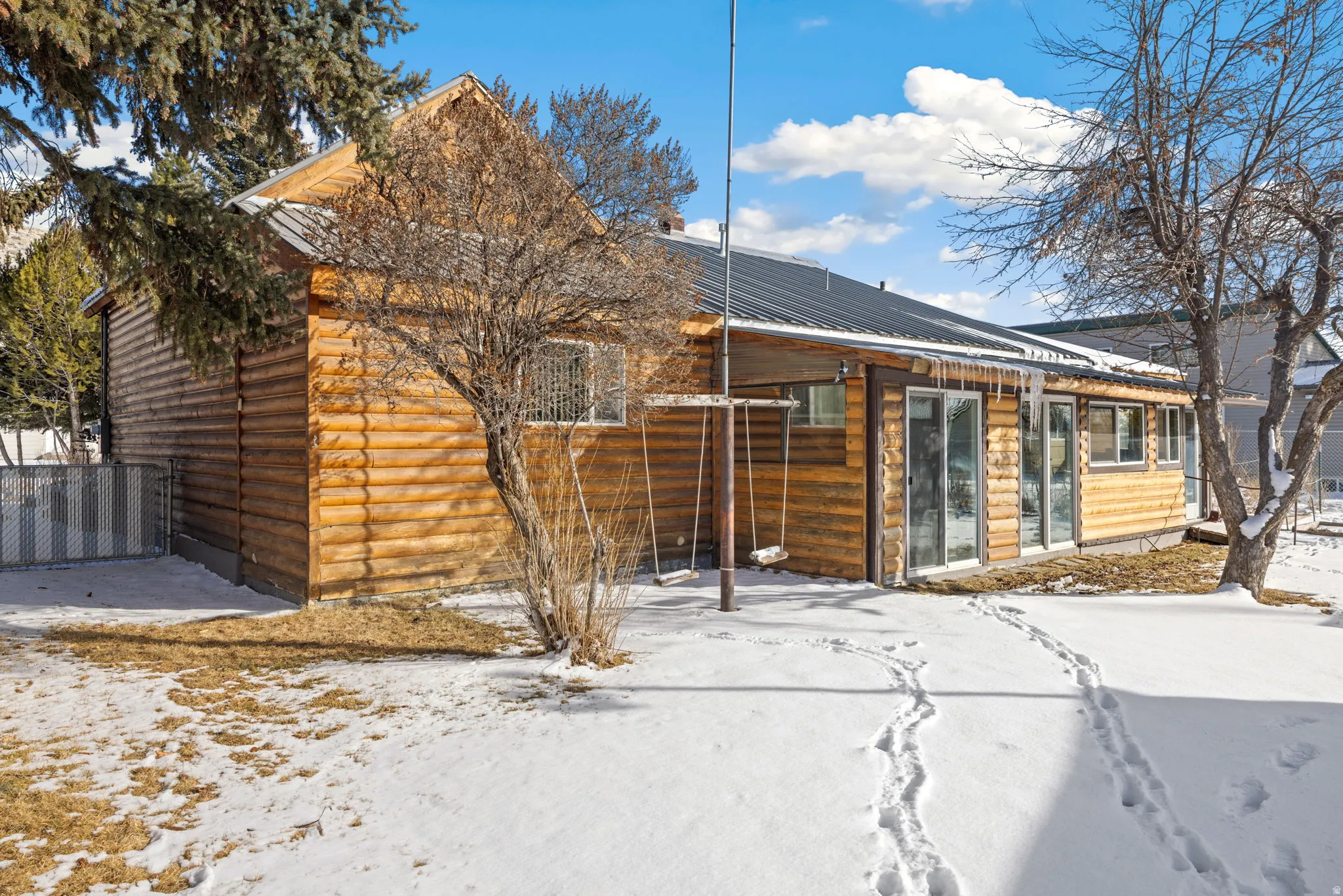 View of front facade with a metal roof