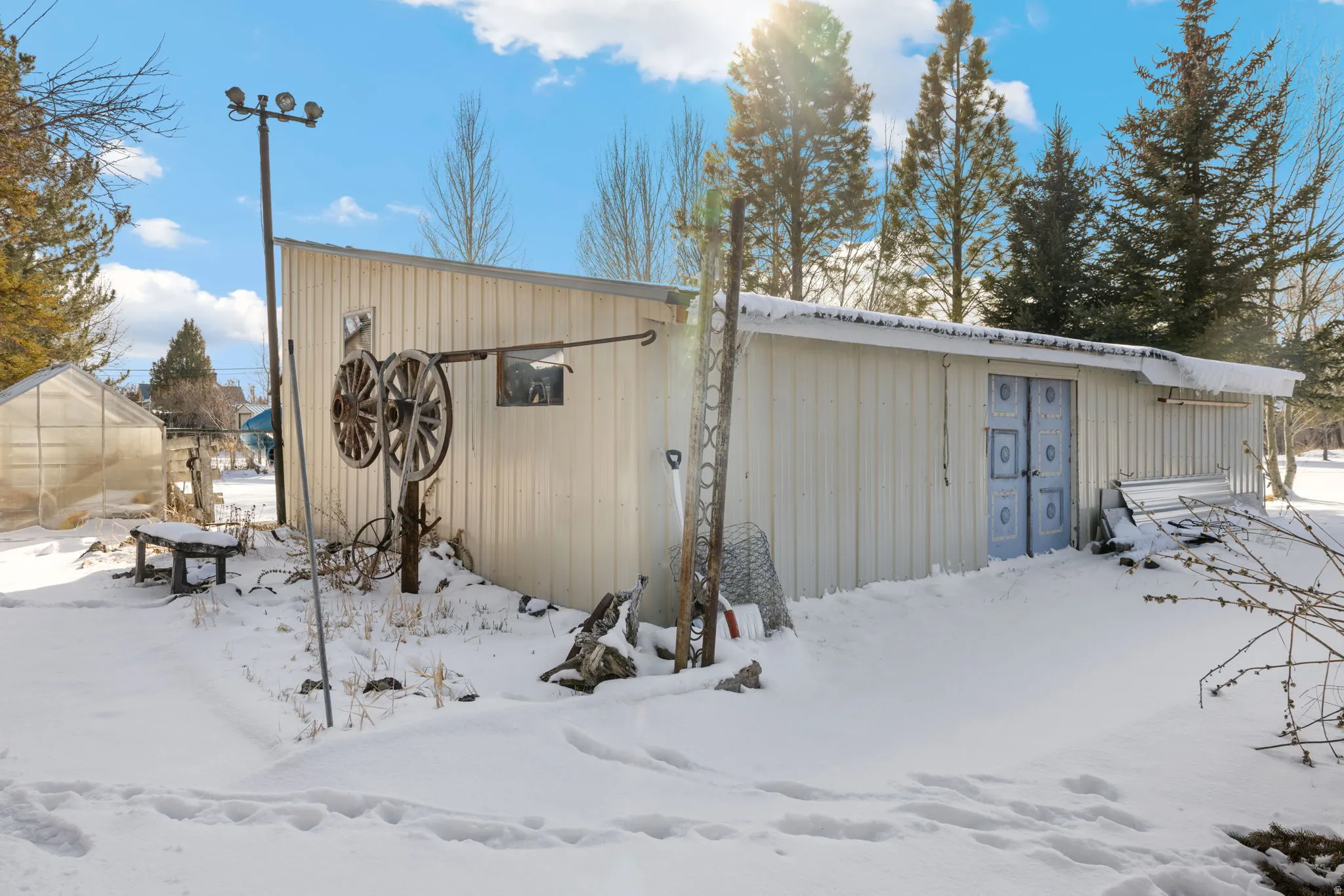 Snow covered structure with an exterior structure