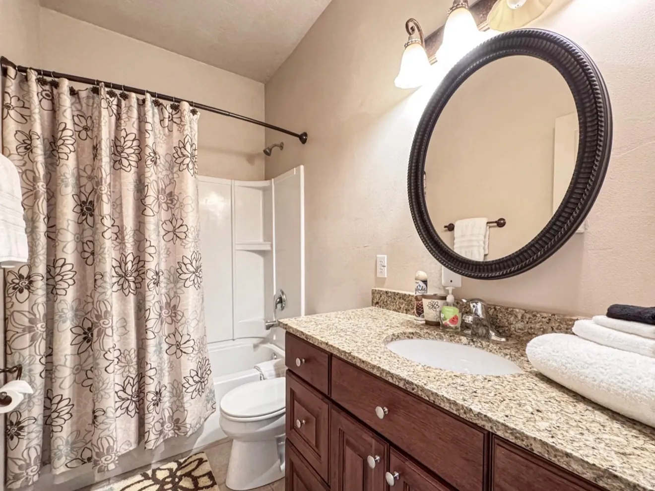 Full bath with vanity and shower / bathtub combination with curtain