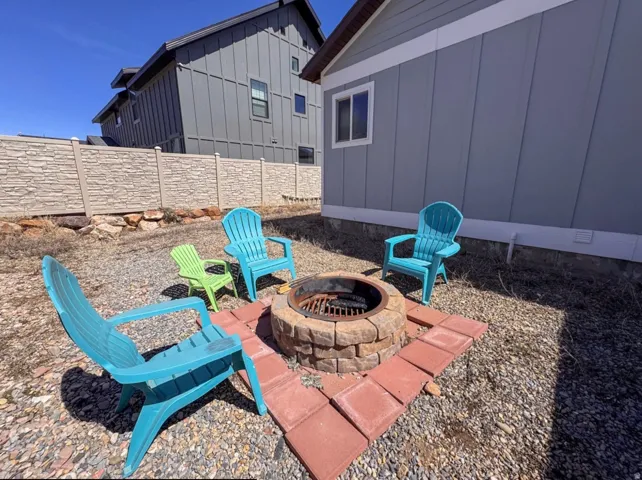 View of patio featuring a fire pit