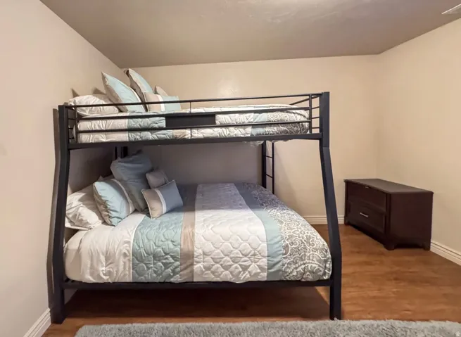 Bedroom with wood finished floors