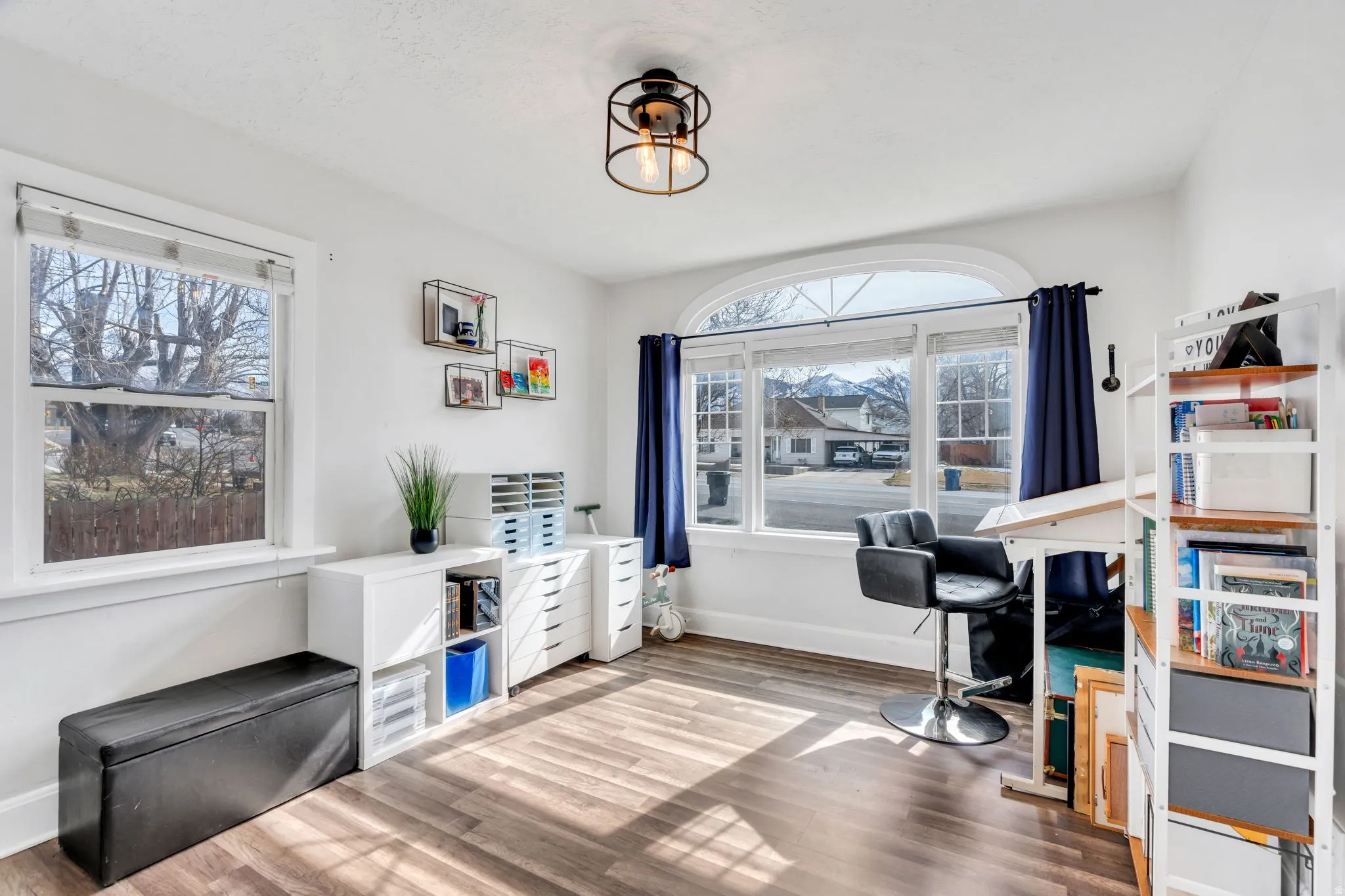 Office area featuring wood finished floors