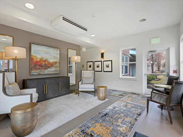 Beautiful main lobby entrance with comfortable seating and vibrant art.