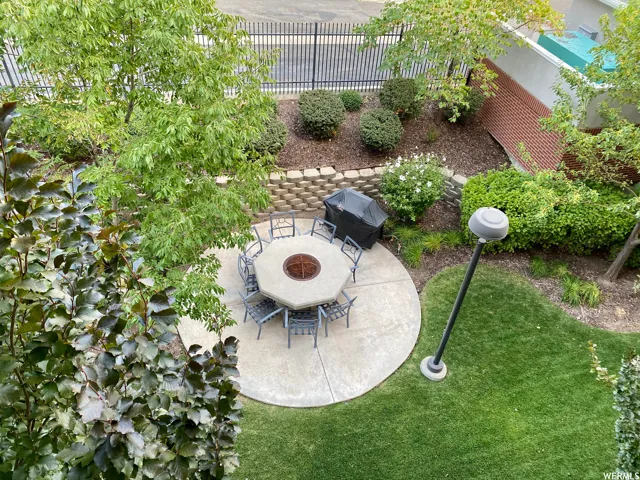 View of yard with a patio area and a fire pit