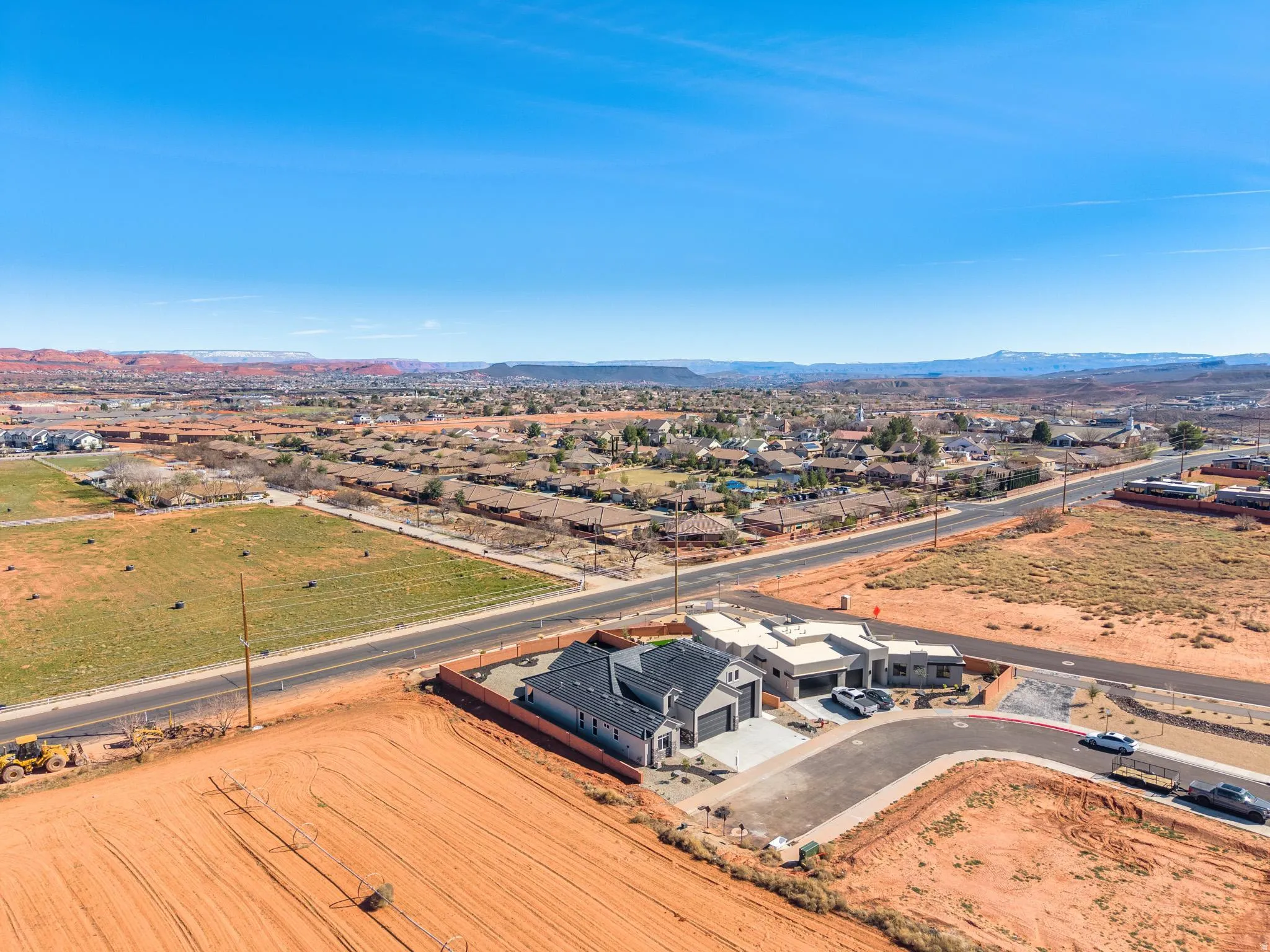 Aerial perspective of suburban area with mountains