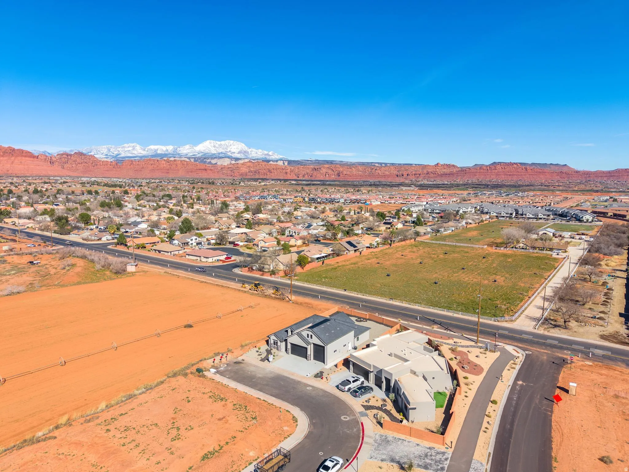 Aerial perspective of suburban area featuring mountains