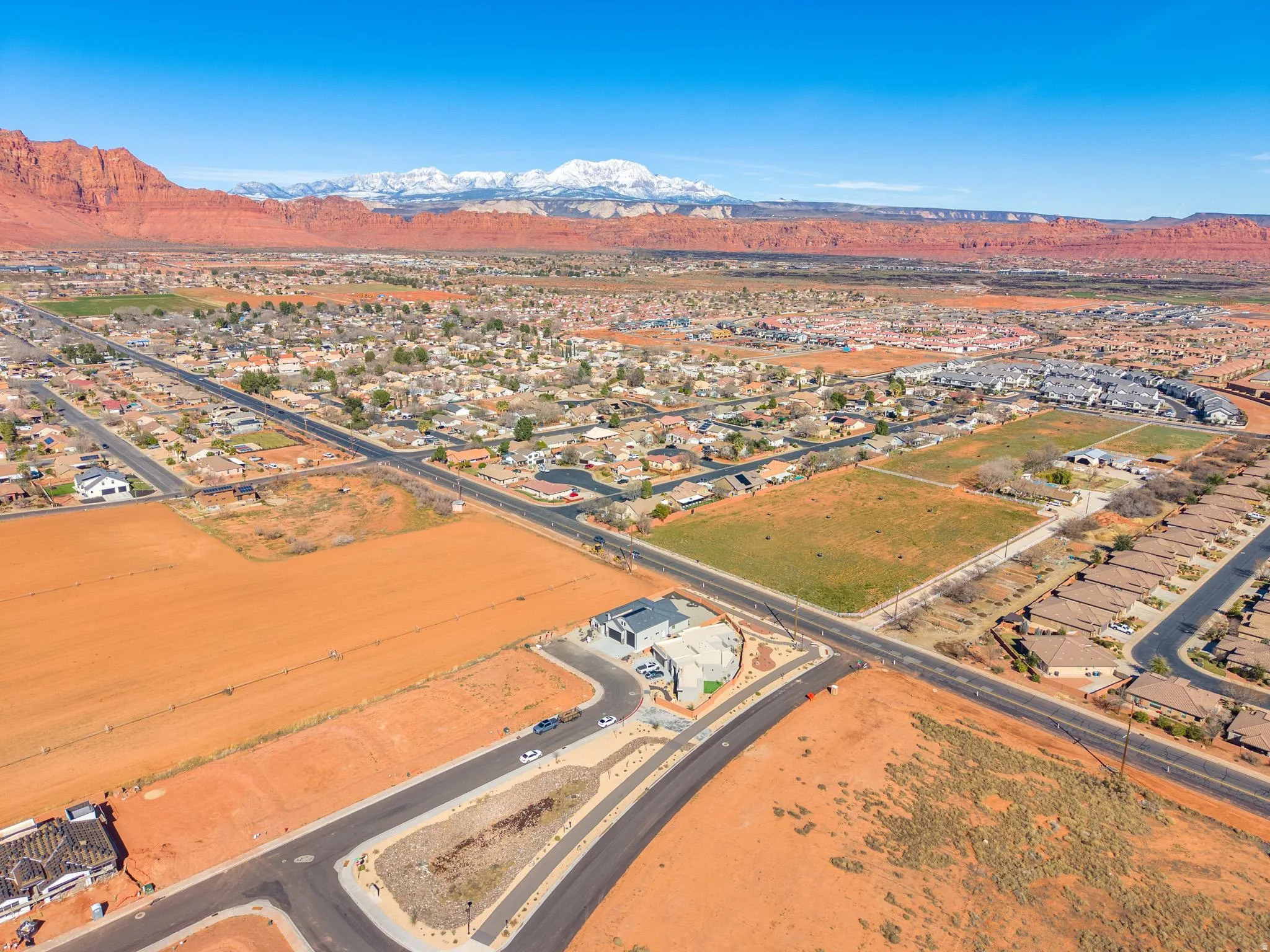 Aerial perspective of suburban area with mountains