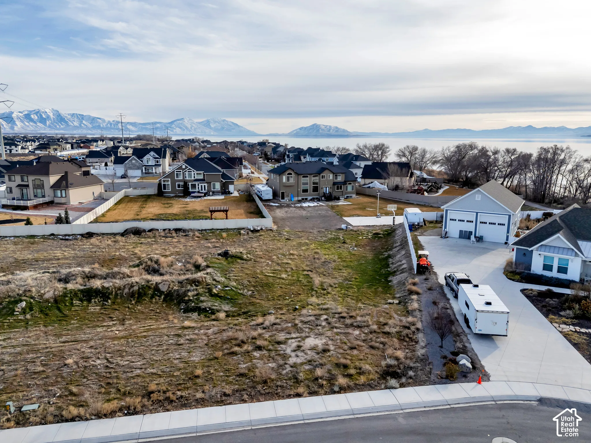 Aerial view of residential area featuring mountains