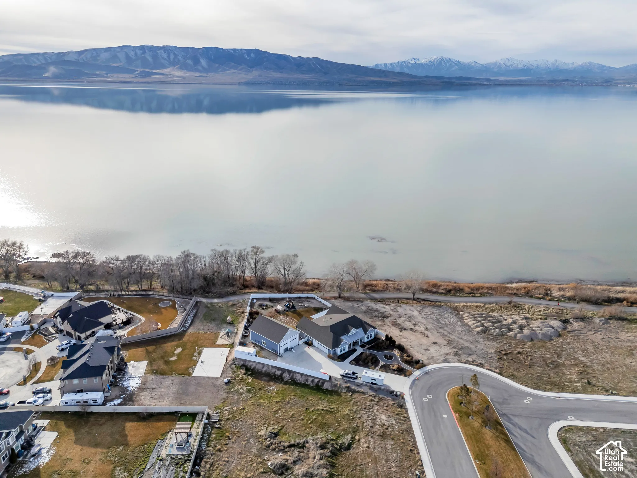 Aerial view of residential area with a water and mountain view
