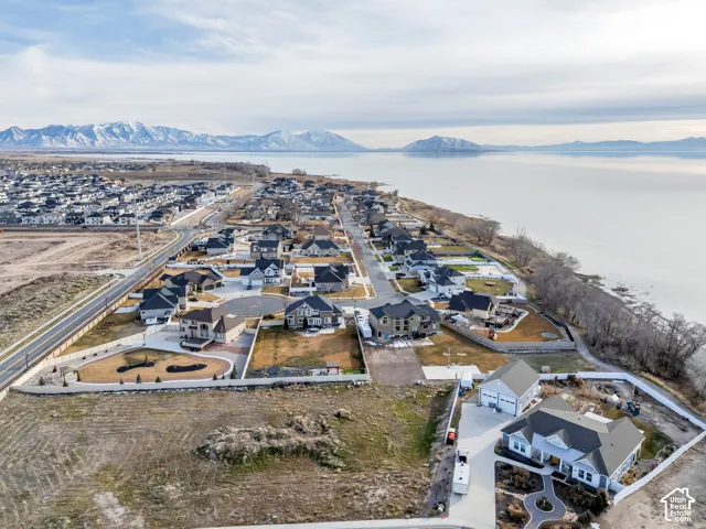 Aerial view of residential area featuring a mountain backdrop