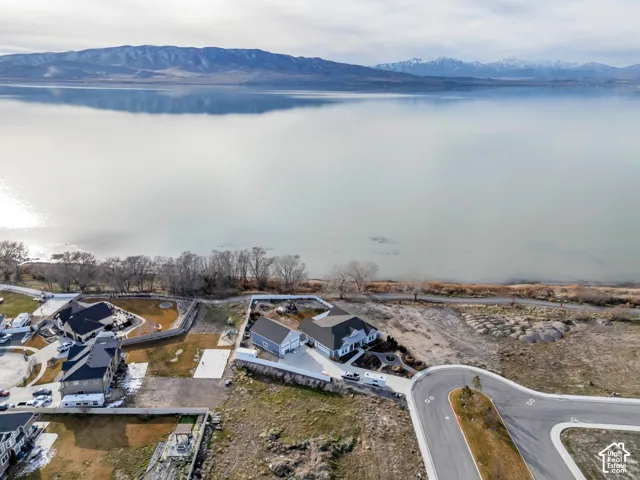 Aerial view of residential area with a water and mountain view