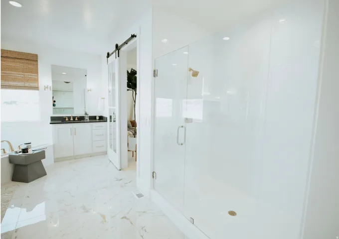 Bathroom with vanity, a shower stall, recessed lighting, light marble finish flooring, and a bathtub