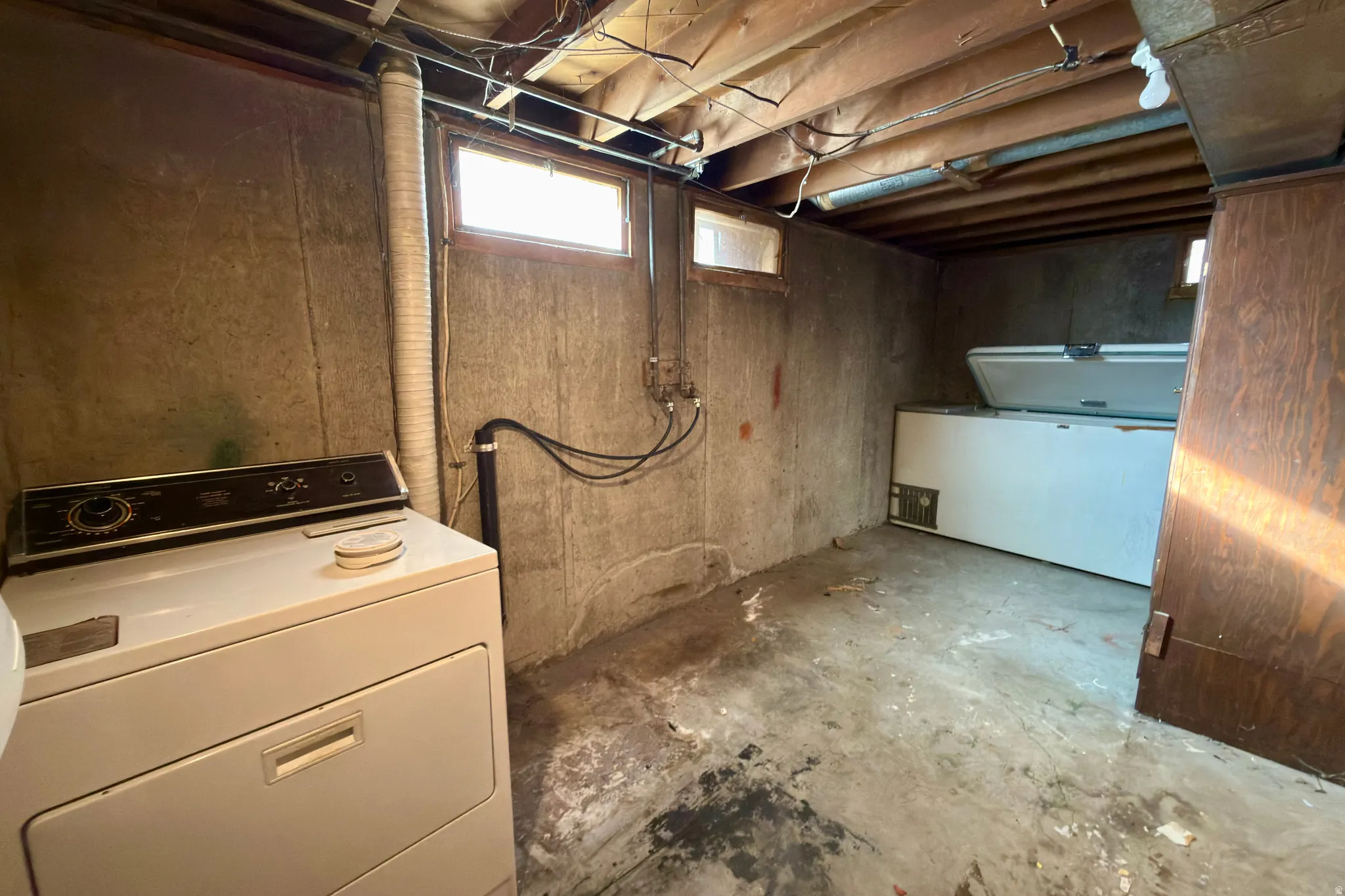 Basement laundry room and storage.