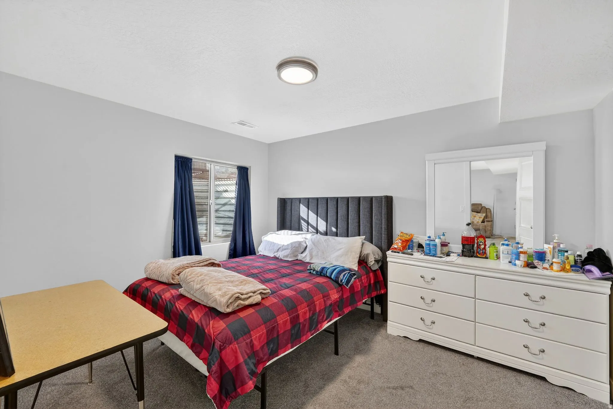 Bedroom featuring carpet flooring