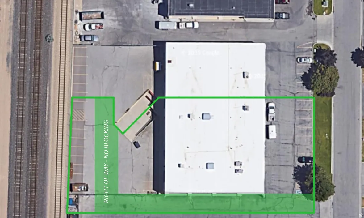 Aerial view of property's location featuring property parcel outlined