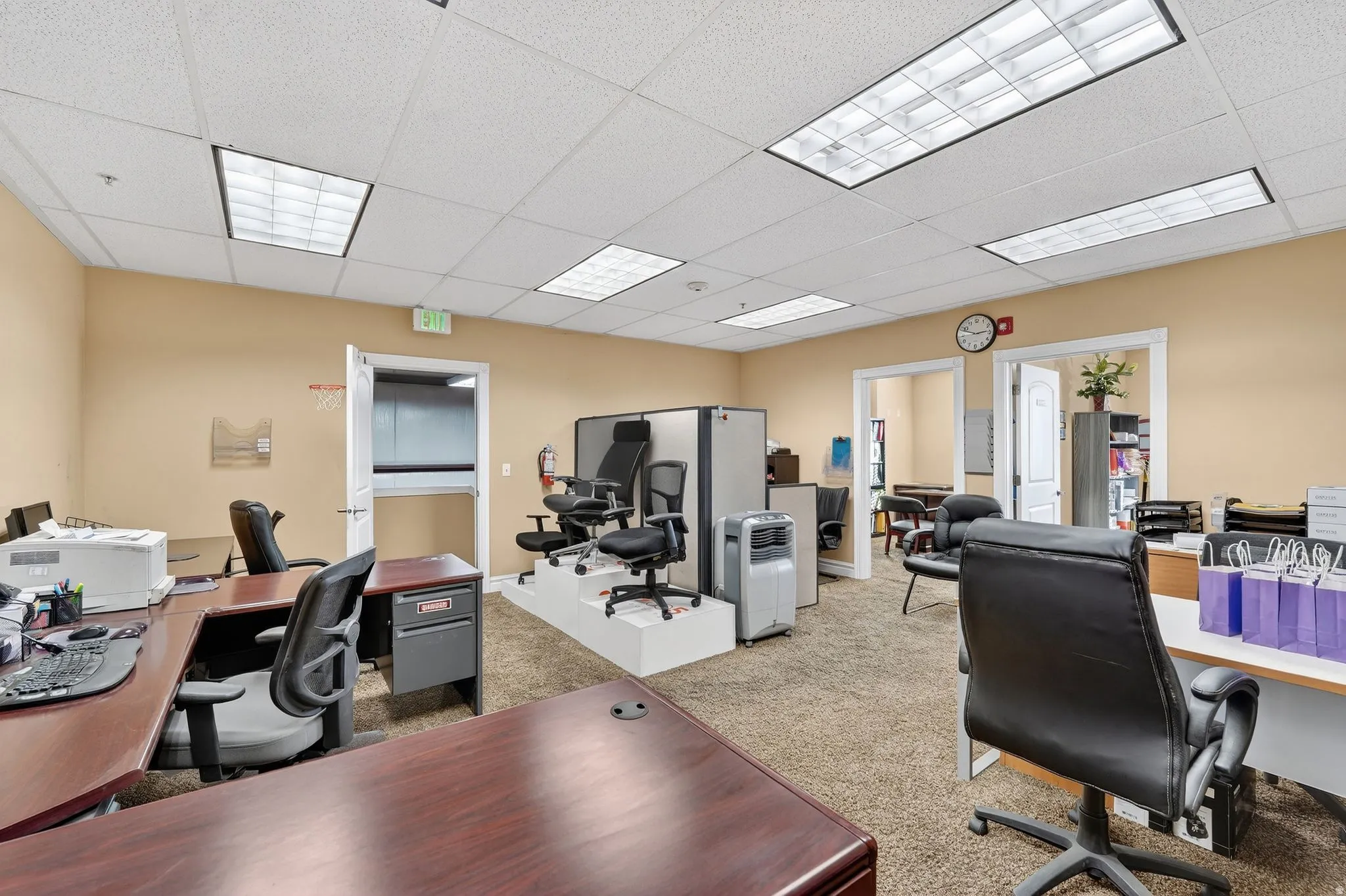 Office featuring a paneled ceiling