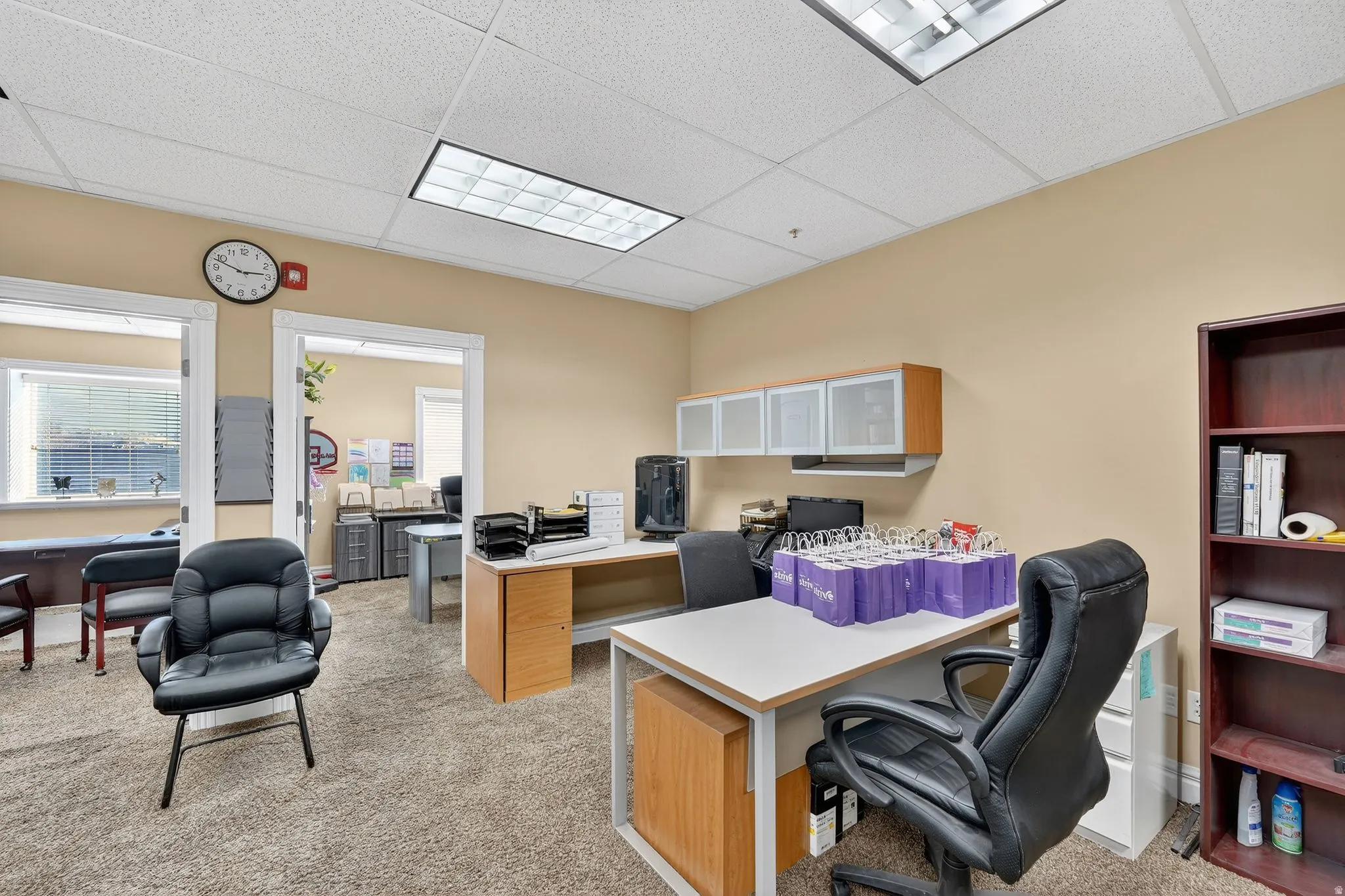 Office featuring a paneled ceiling