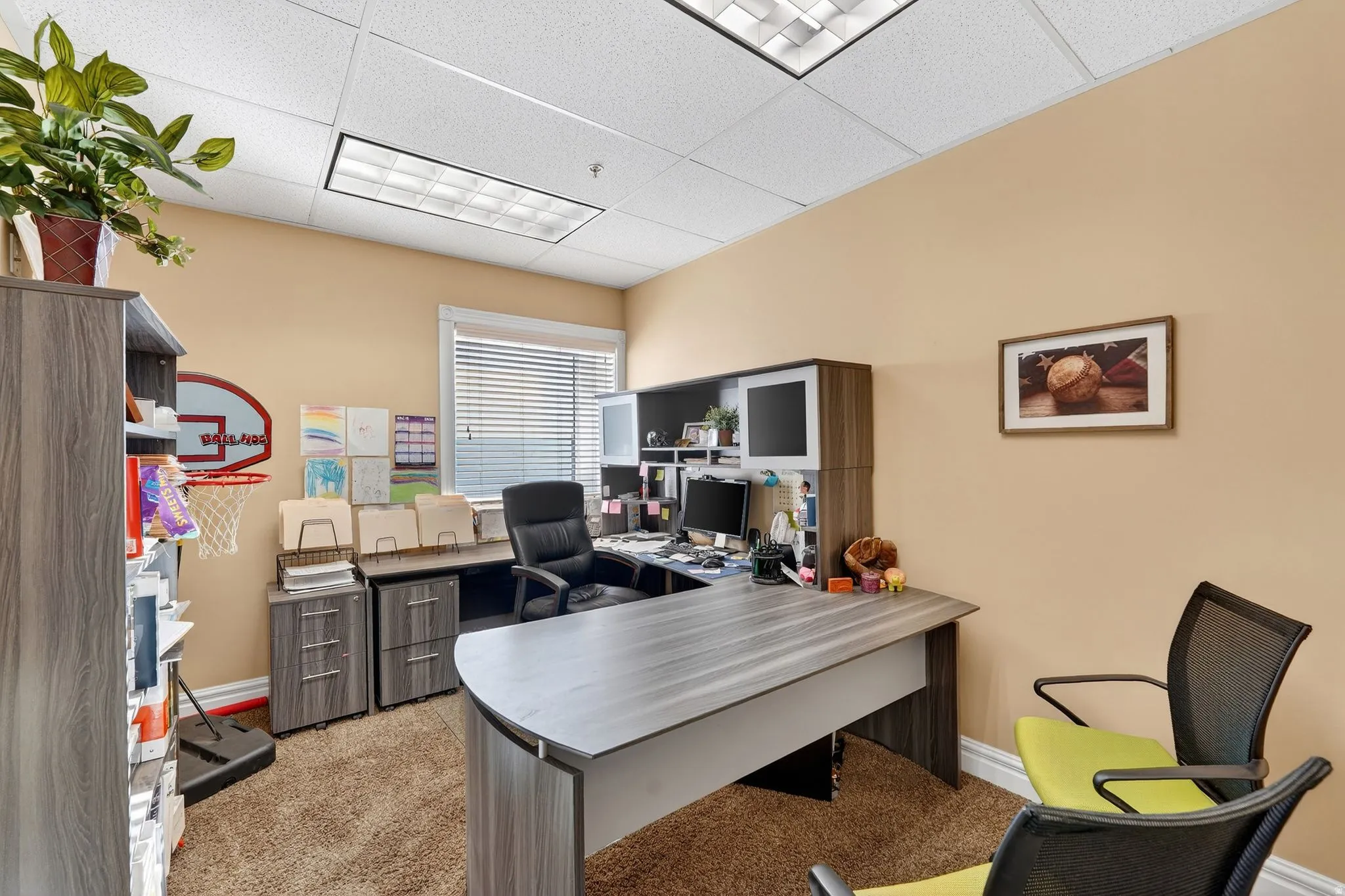 Home office with a paneled ceiling