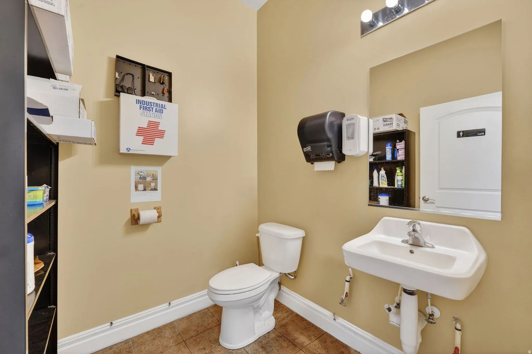 Half bath featuring toilet