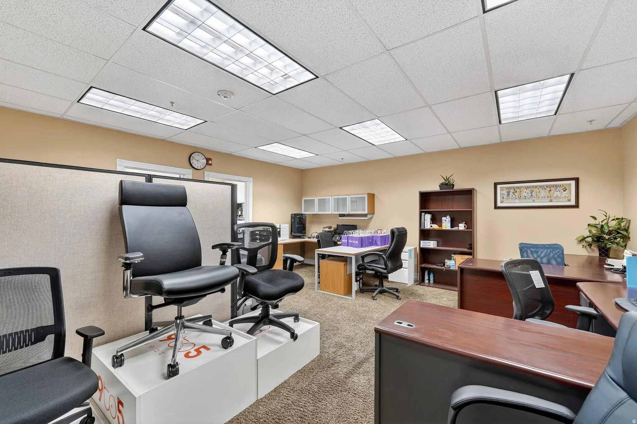 Office area featuring a paneled ceiling