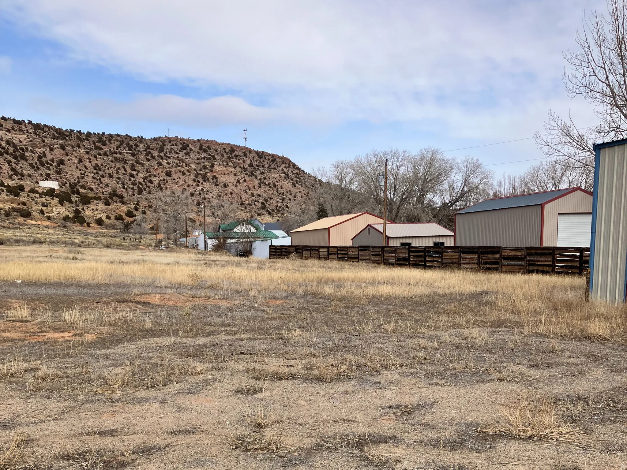 View of yard featuring an outbuilding and a mountain view