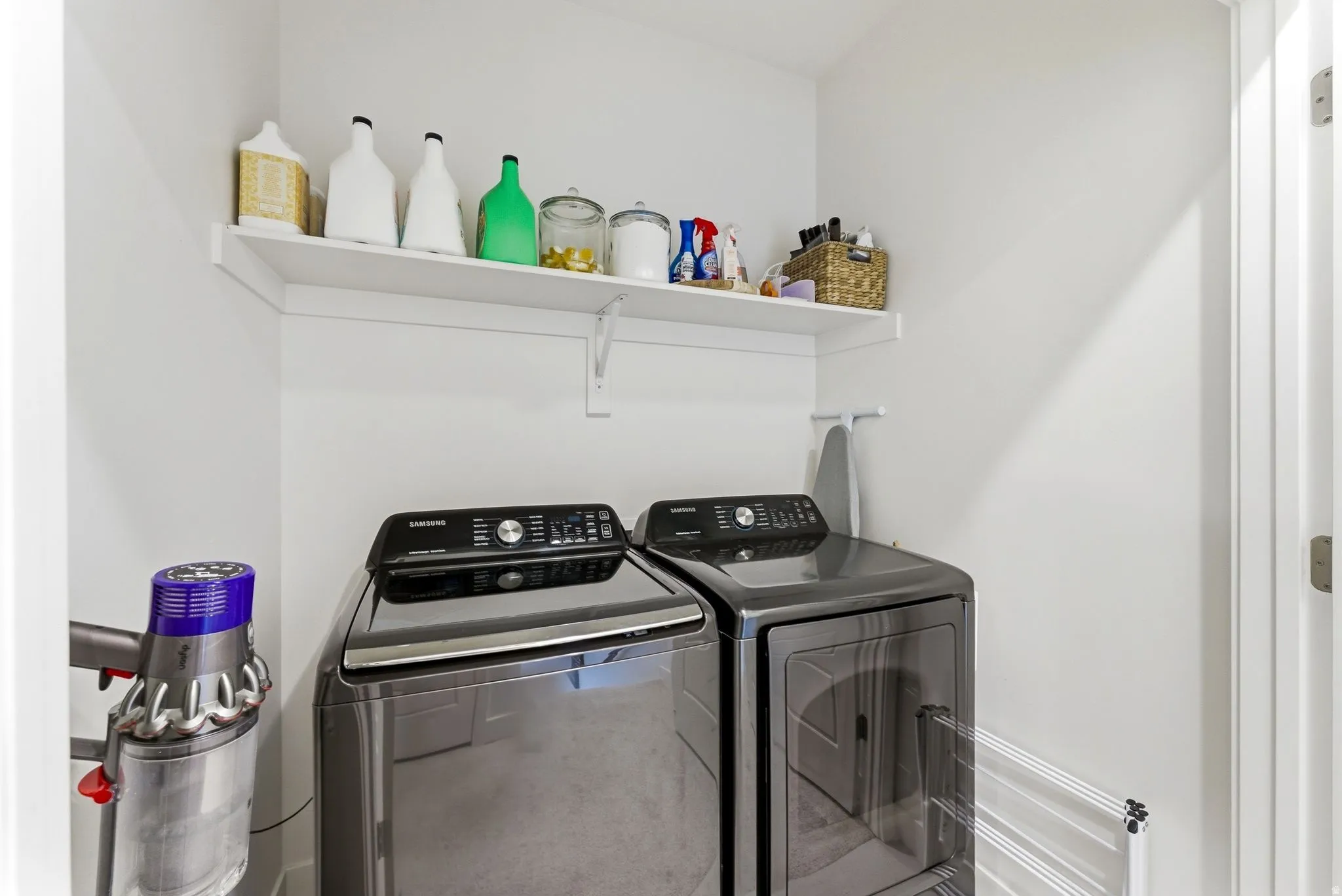 Laundry area with separate washer and dryer