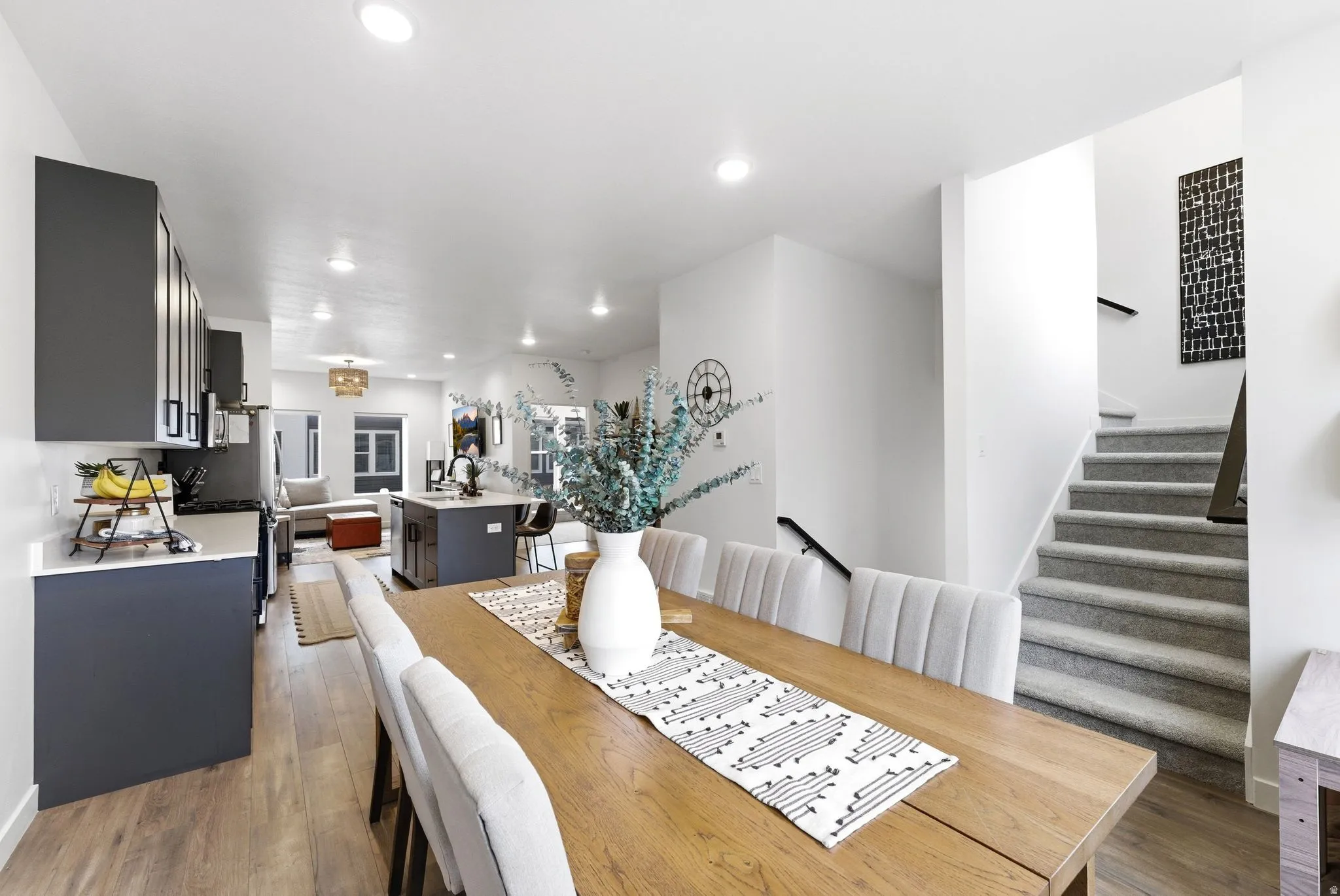Dining space featuring light wood-style floors and recessed lighting