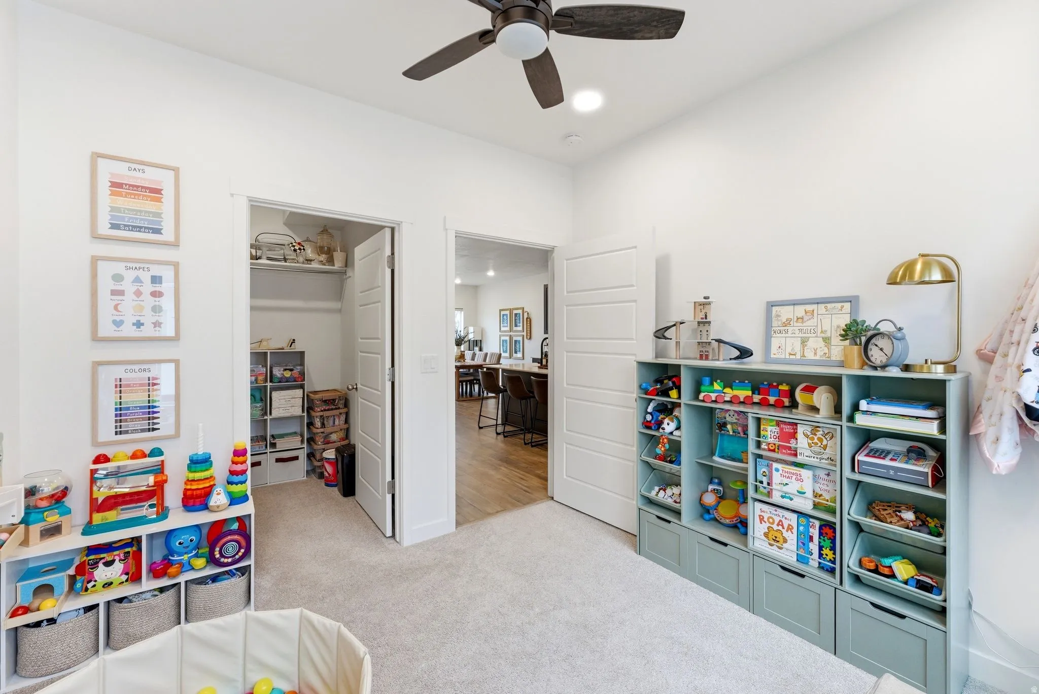 Game room with light carpet, ceiling fan, and recessed lighting