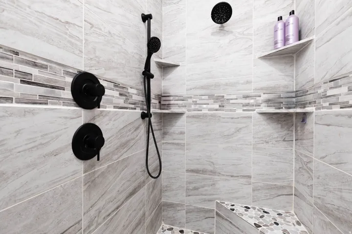 Full bath with tiled shower