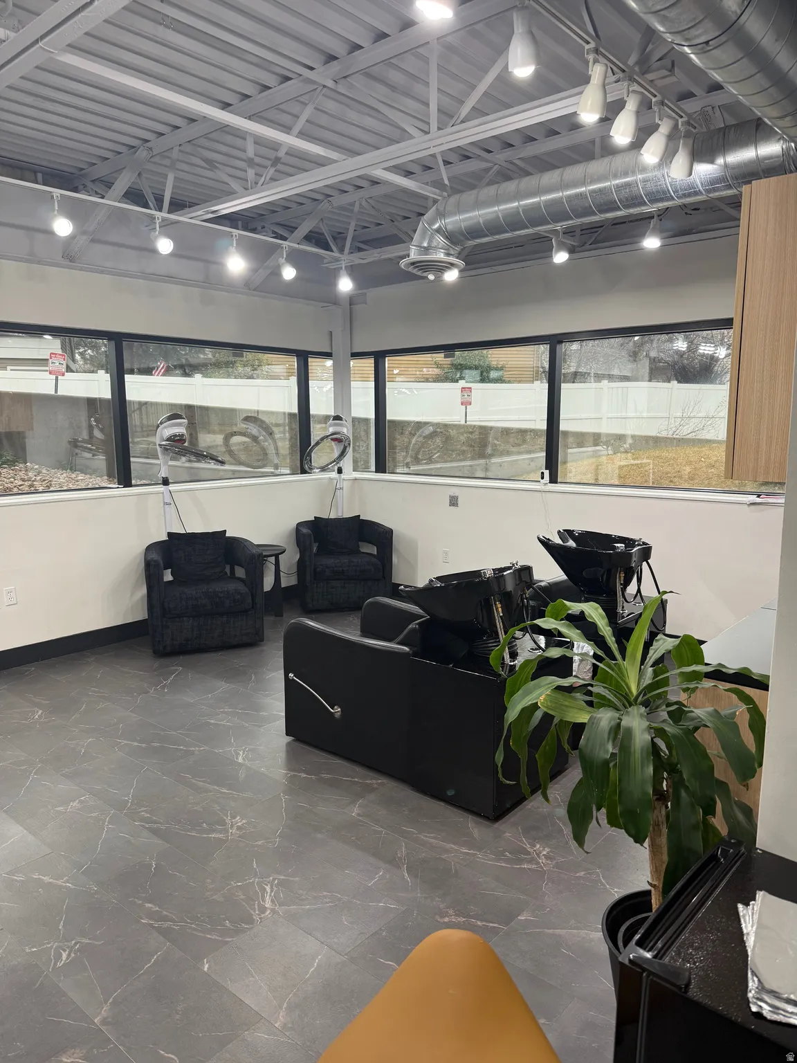 Common area featuring track lighting