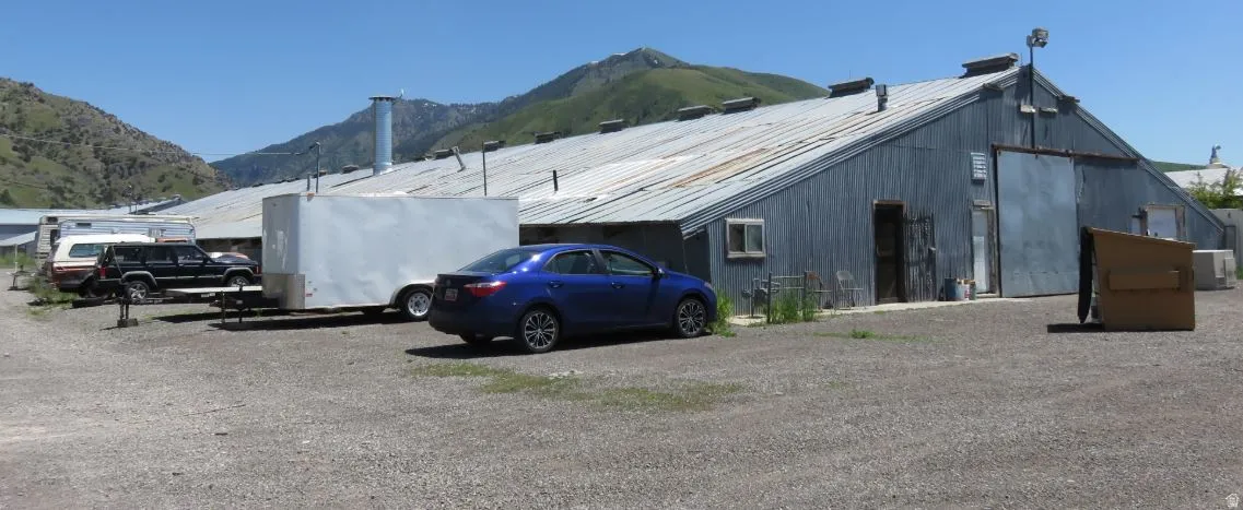 View of outbuilding featuring a mountain view