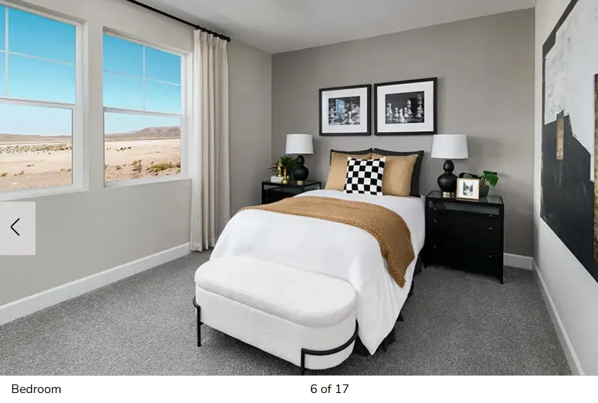 Bedroom with baseboards and carpet