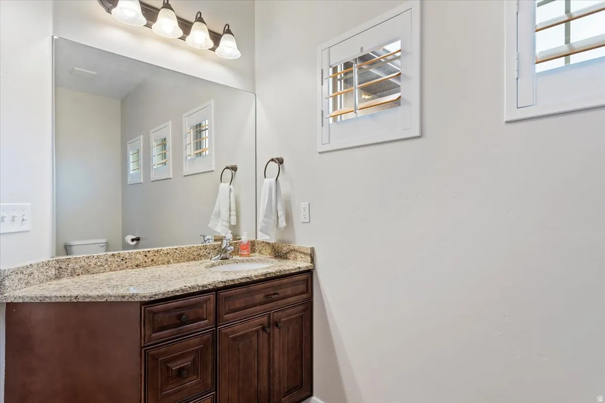 Bathroom with plenty of natural light and vanity