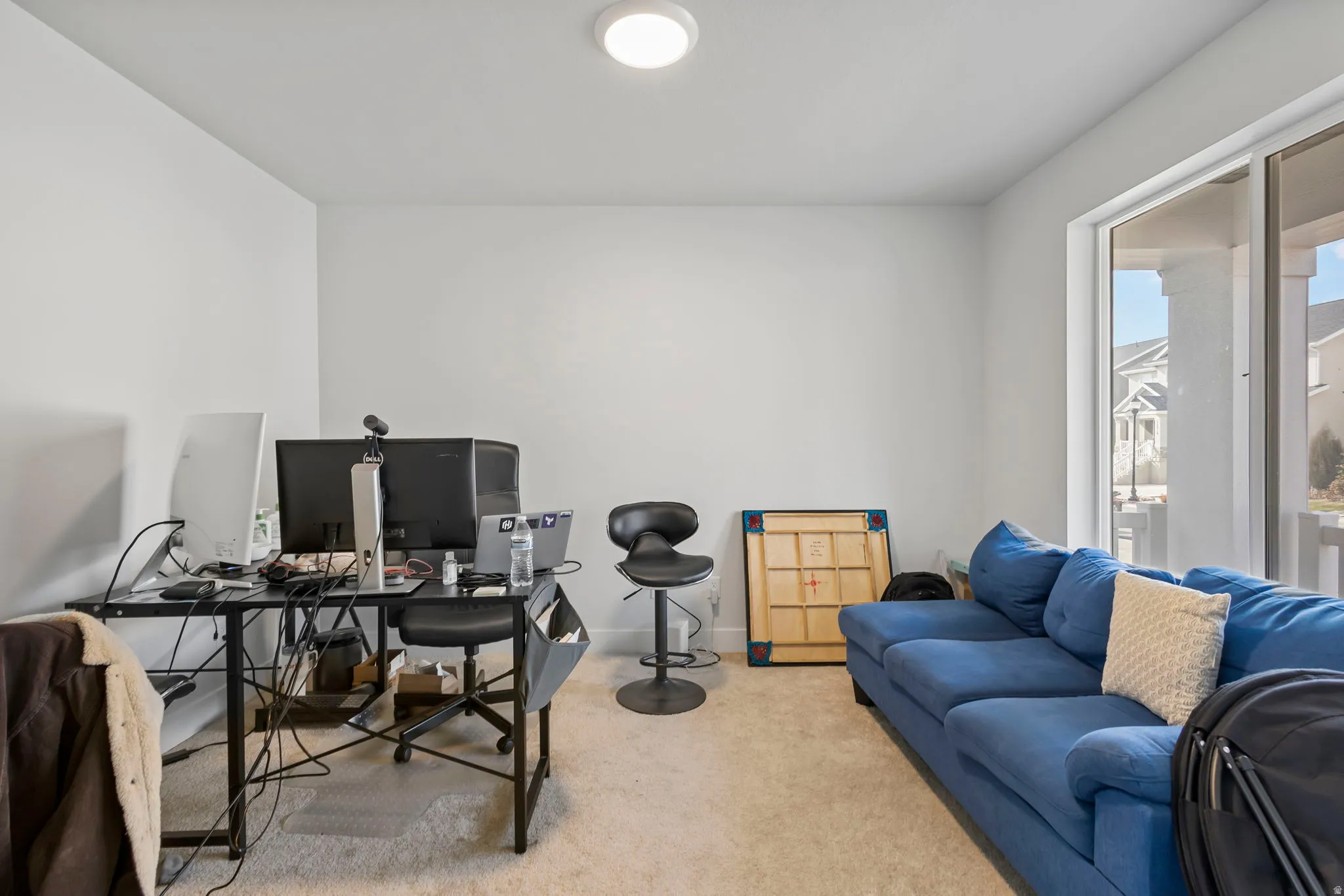 Office featuring carpet floors and baseboards