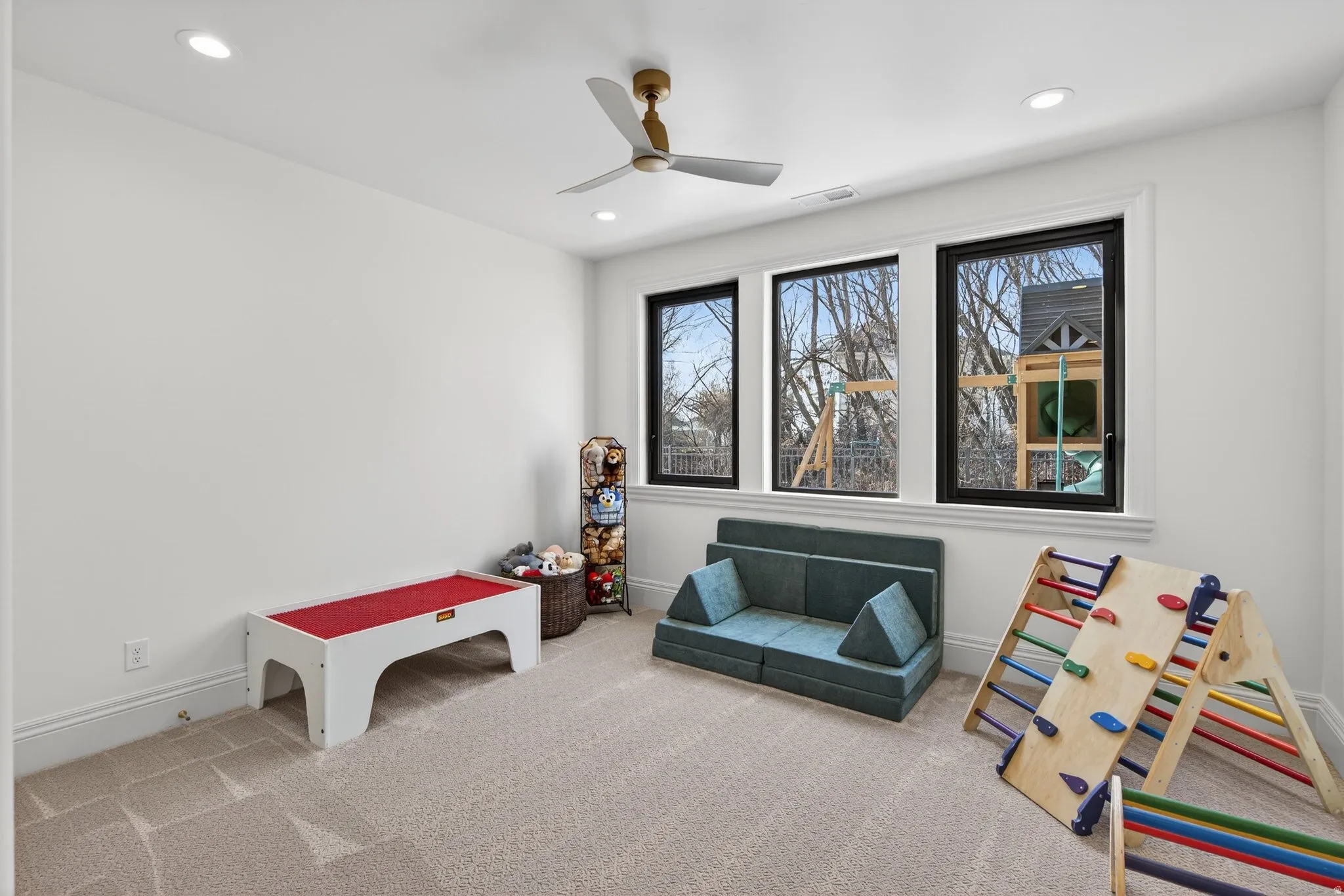Lower Level Bedroom/Playroom with carpet, a ceiling fan, and recessed lighting