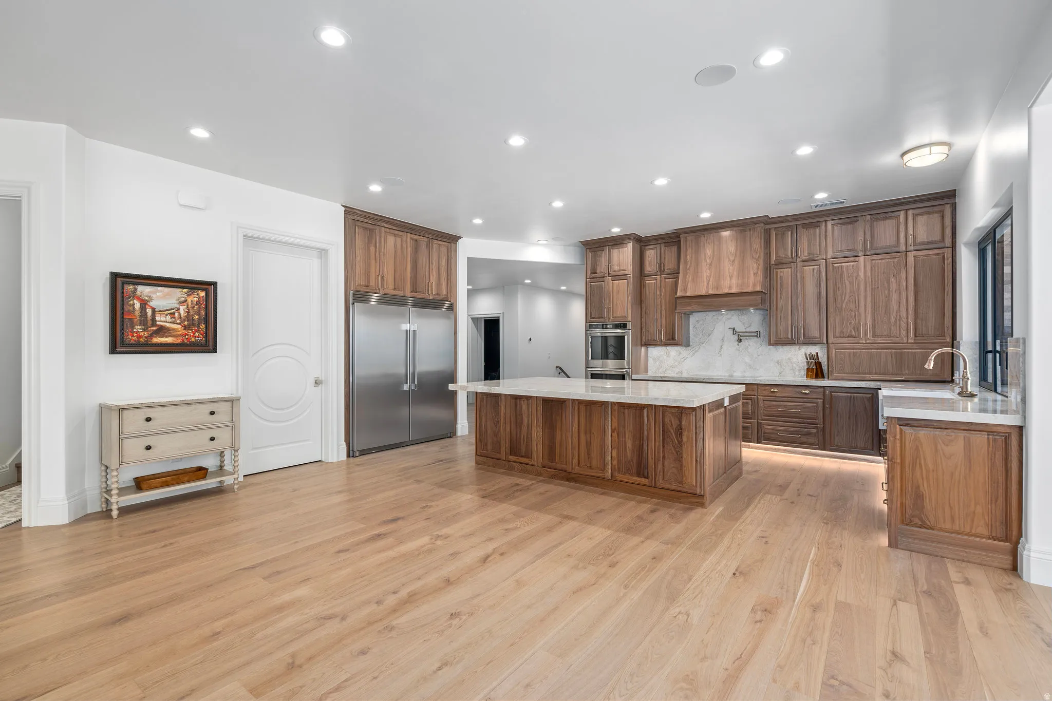 Lower Level Stainless steel built-in fridge/freezer, Pantry Door