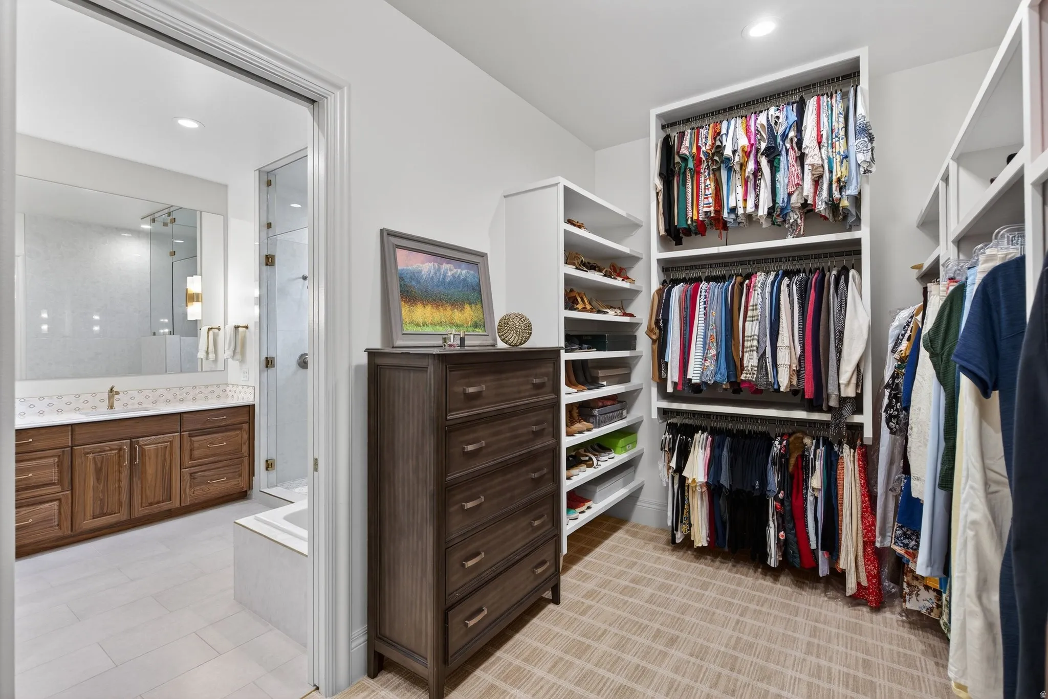 Lower Level Primary Separate His/Her Walk in Closets