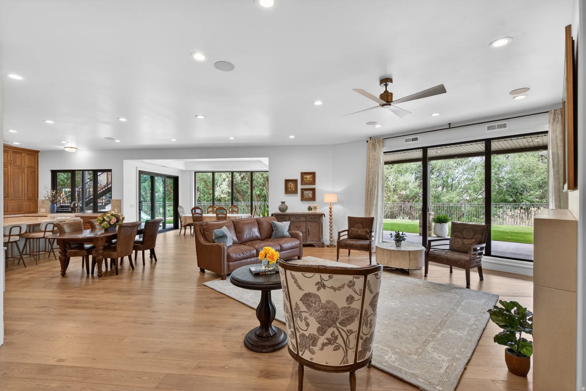 Daylight Basement with open-concept living space featuring oak flooring, 10 ft. ceiling