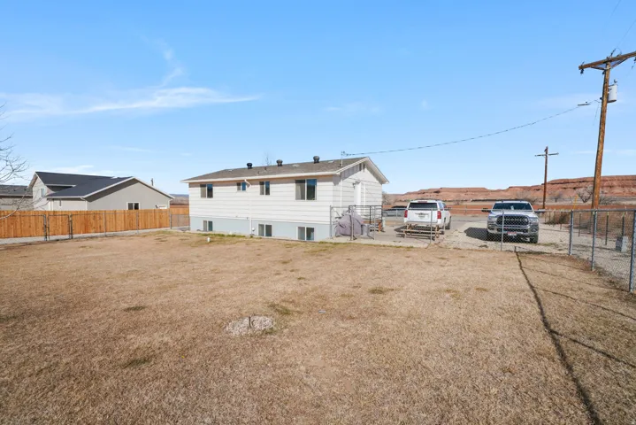 Rear view of house with a patio