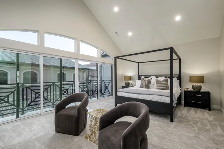 Carpeted bedroom featuring lofted ceiling, access to outside, and recessed lighting