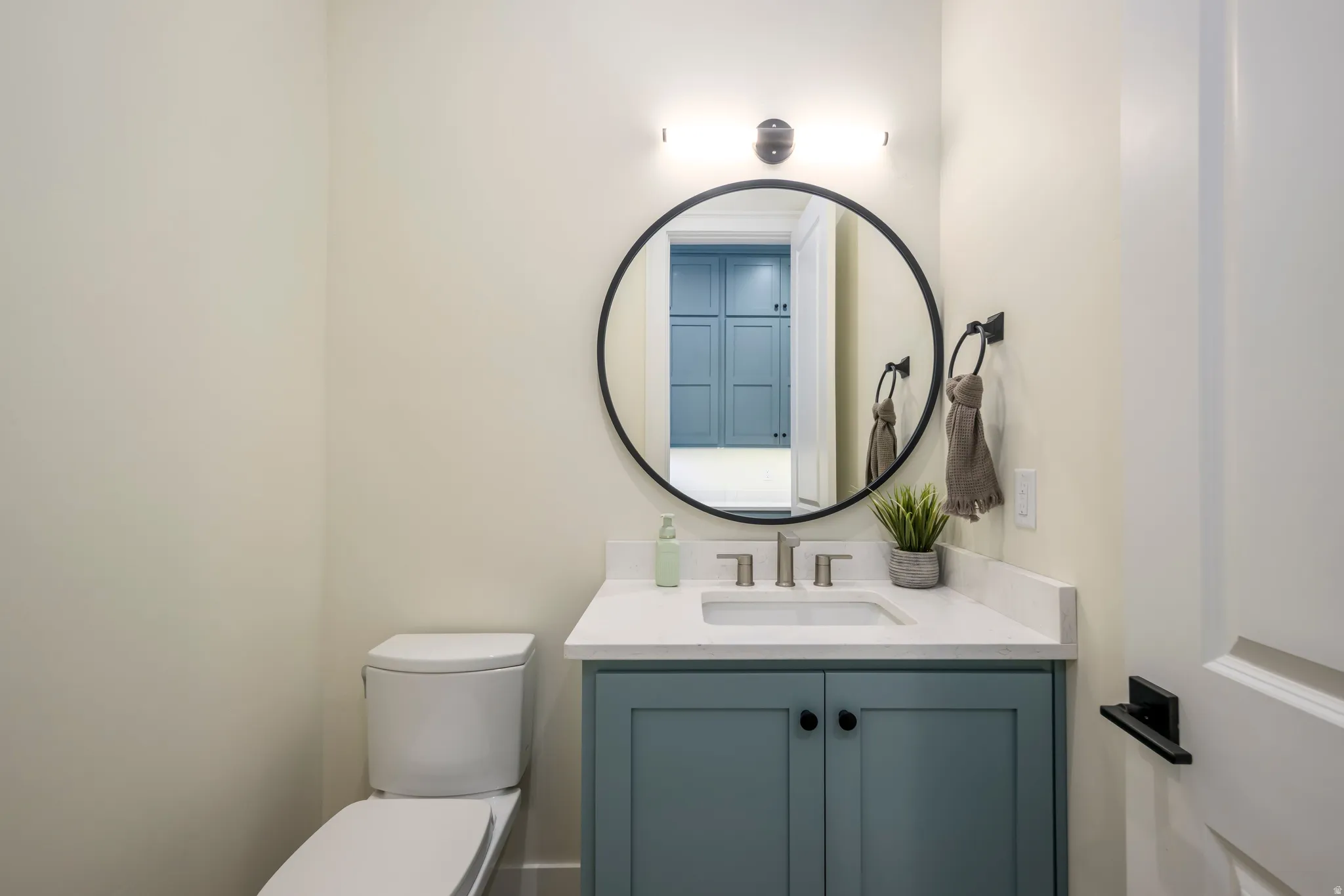 Bathroom with vanity and toilet