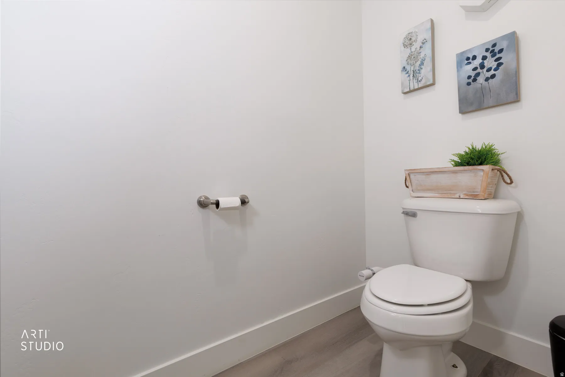 Bathroom featuring wood finished floors