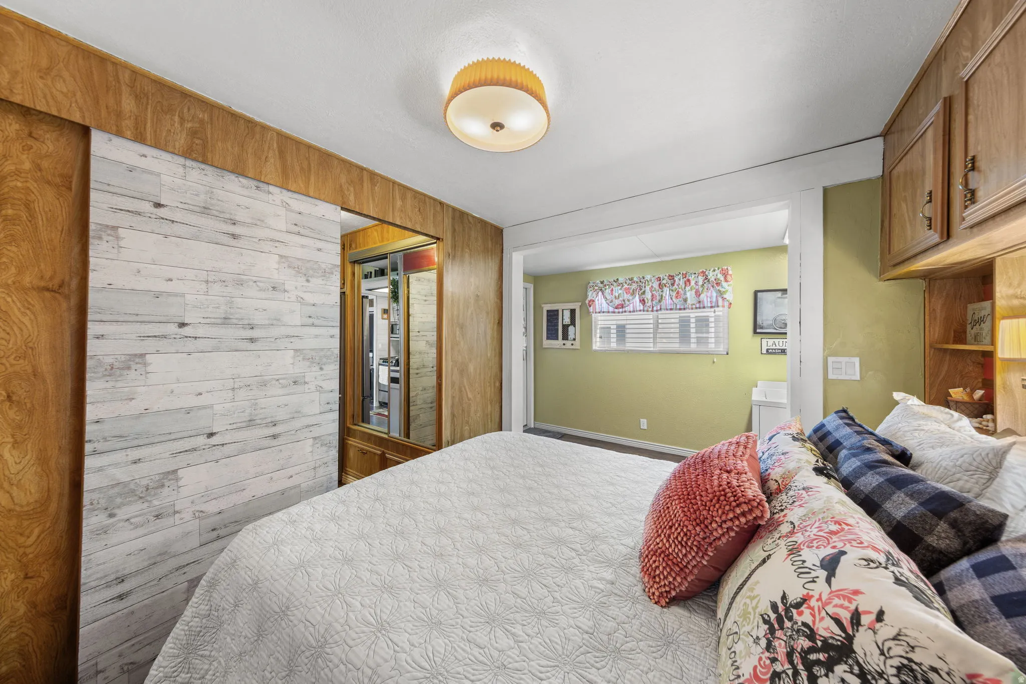 Bedroom with wooden walls