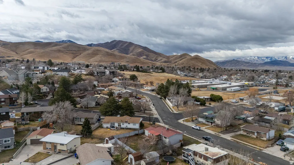 Aerial perspective of suburban area featuring mountains
