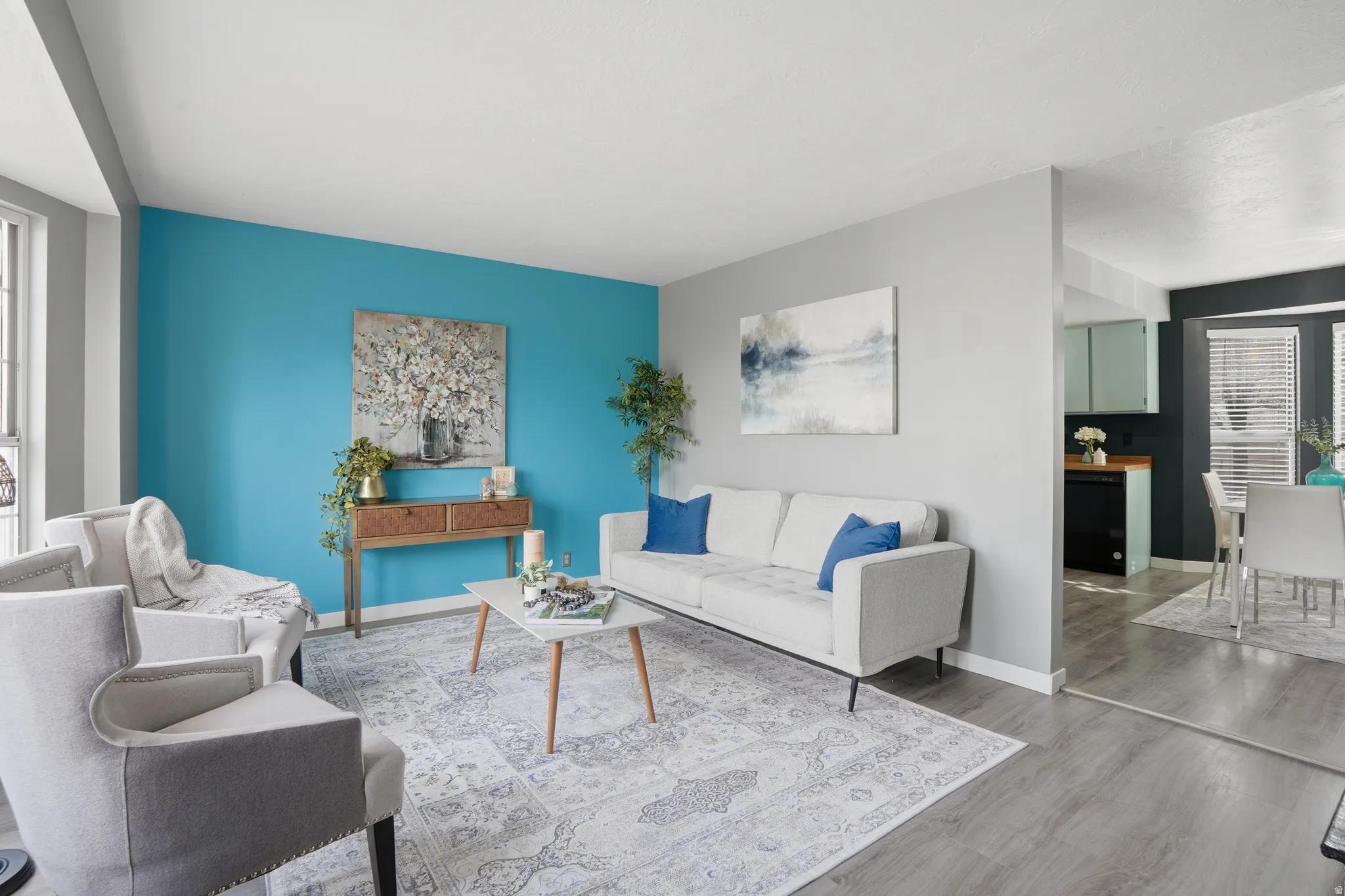 Living room with wood finished floors and baseboards