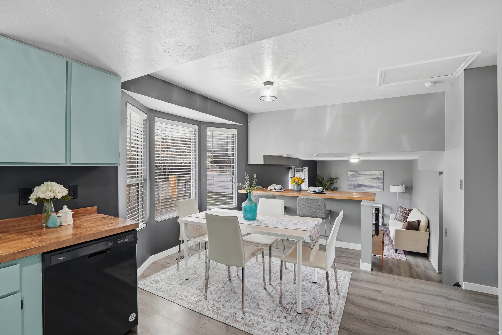 Dining space with light wood-type flooring