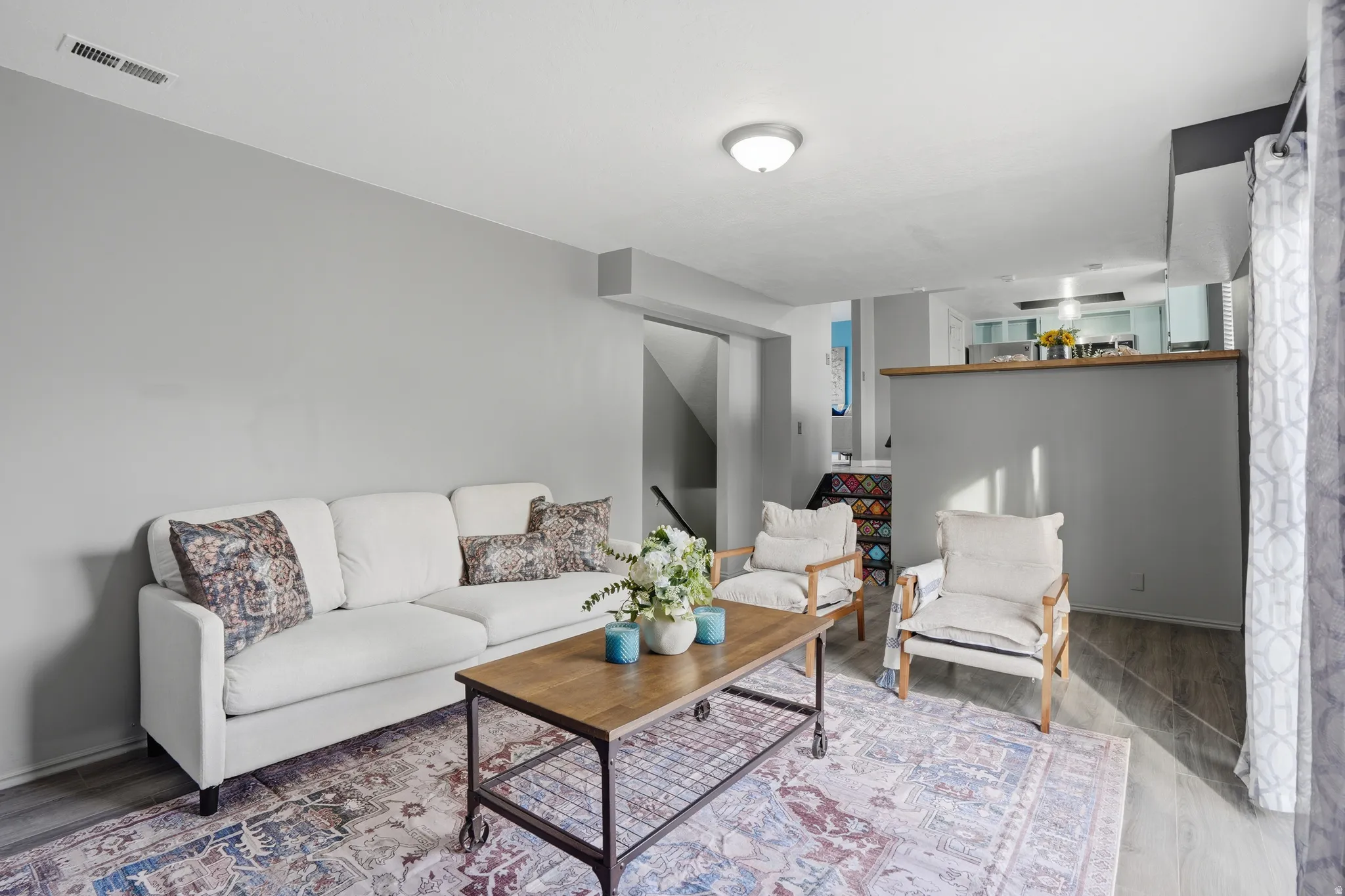 Living area with wood finished floors