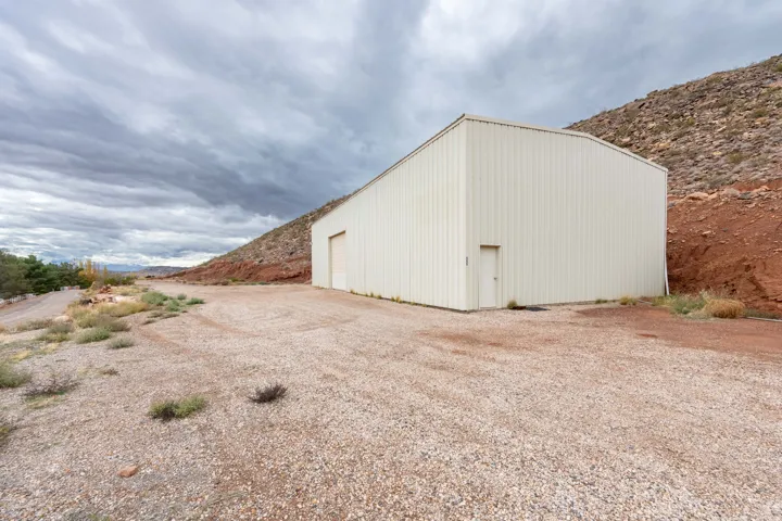 View of outbuilding with a mountain view